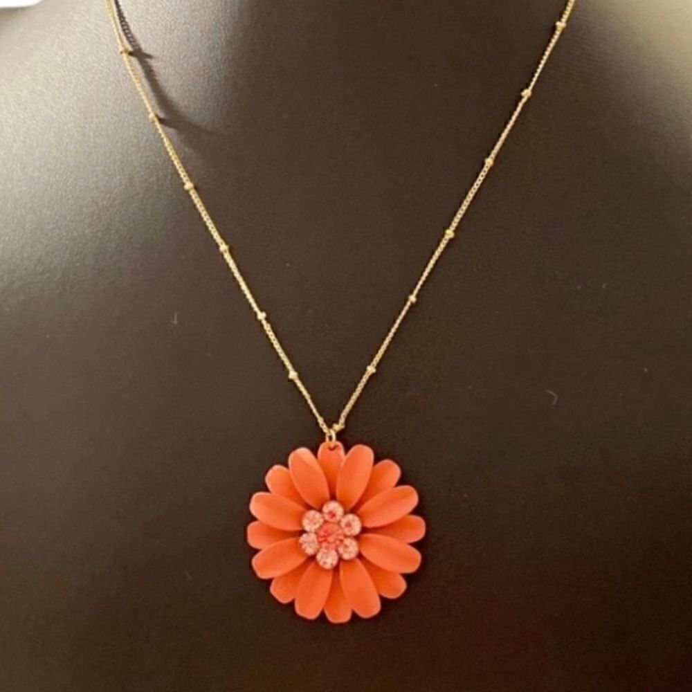 Beautiful Orange Flower Necklace on a delicate looking gold toned chain.